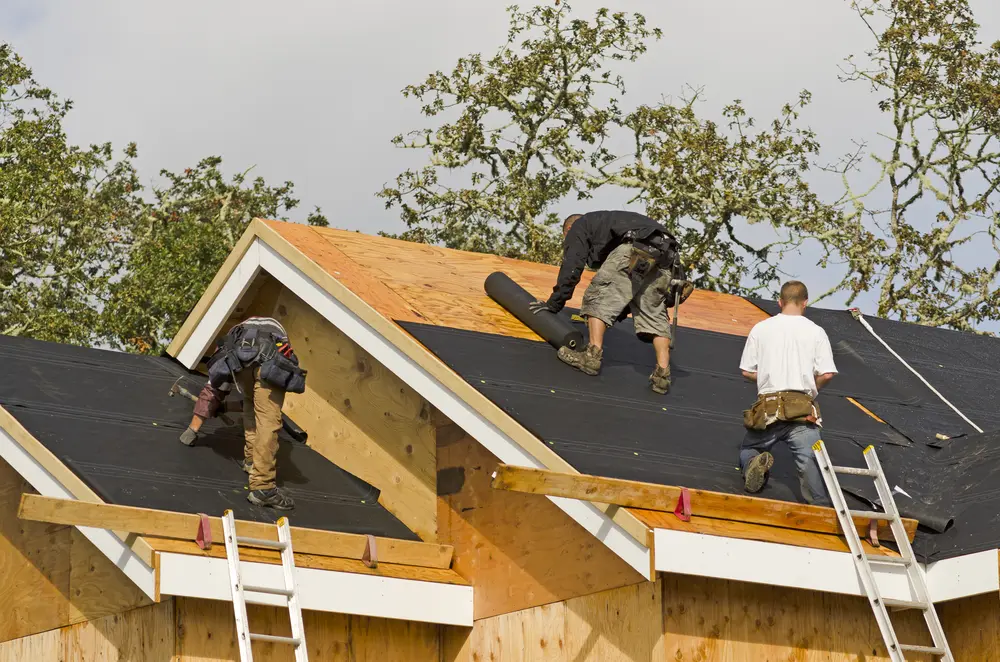 Roof underlayment exposed during a tile roof repair